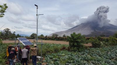 A telemetered, solar-powered scanning spectrometer was installed in 2016 at Sinabung Volcano in Sumatra, Indonesia. It measures sulfur dioxide gas emissions, which helps forecast volcanic activity.  (Click image to view full size.)