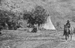 Image, ca.1900, Nez Perce man rides through camp, Spalding, Idaho, click to enlarge