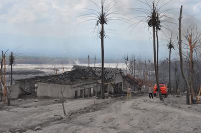 Thousands were saved by accurate eruption forecasts of Mount Merapi, Indonesia. House in the village of Kopeng, 6 km (3.7 miles) from summit of Mount Merapi, destroyed by the explosive eruption.  (Click image to view full size.)