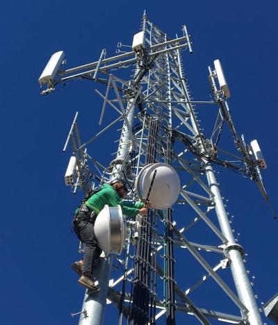UNAVCO field engineer Dylan Cembalski replaces damaged antennas on the communications tower at Sawtell Peak (Click image to view full size.) UNAVCO field engineer Dylan Cembalski replaces damaged antennas on the communications tower at Sawtell Peak (Click image to view full size.)