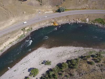 UAV photo showing LaDuke Hot Spring (yellowish orange color in the center) discharging to the Yellowstone River. (Click image to view full size.) UAV photo showing LaDuke Hot Spring (yellowish orange color in the center) discharging to the Yellowstone River. (Click image to view full size.)