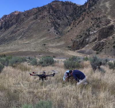 Montana Bureau of Mines and Geology and Montana Tech scientists preparing for a UAV flight on the west side of the Yellowstone River adjacent from LaDuke Hot Springs. (Click image to view full size.) Montana Bureau of Mines and Geology and Montana Tech scientists preparing for a UAV flight on the west side of the Yellowstone River adjacent from LaDuke Hot Springs. (Click image to view full size.)